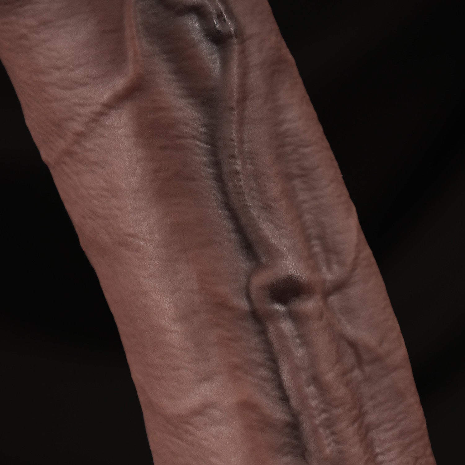 Close view of silicone dildo showing fine skin-like texture