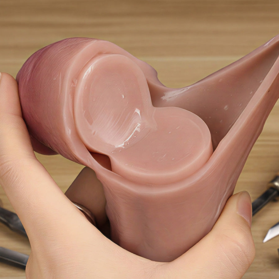 The dildo is cut open to reveal its double-layered structure